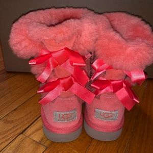 Girls coral colored Ugg boots